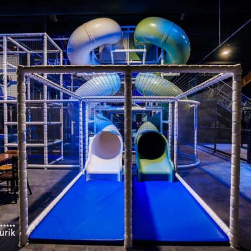 White tube slide indoor playground ELI Play